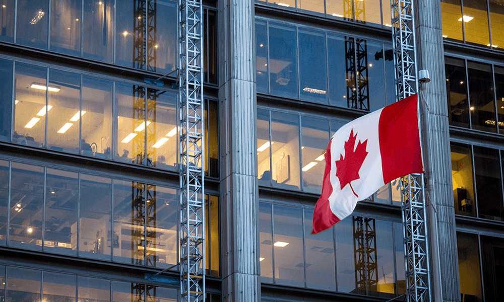 Canadian Flag in from of building